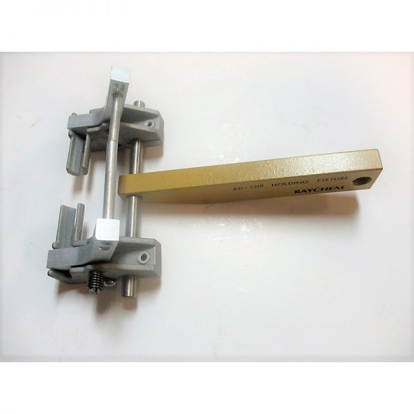 AD-1319-6-13 Holding Fixture Mfg: Raychem Condition: New Surplus