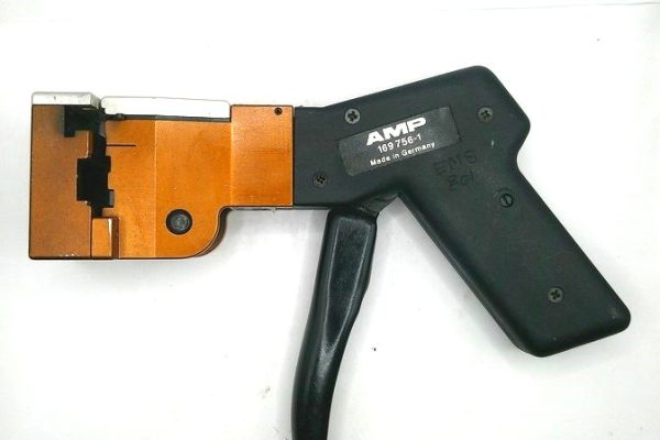 169756-1 Pistol Grip With AM60066 Crimp Head Mfg. Molex Condition: Used